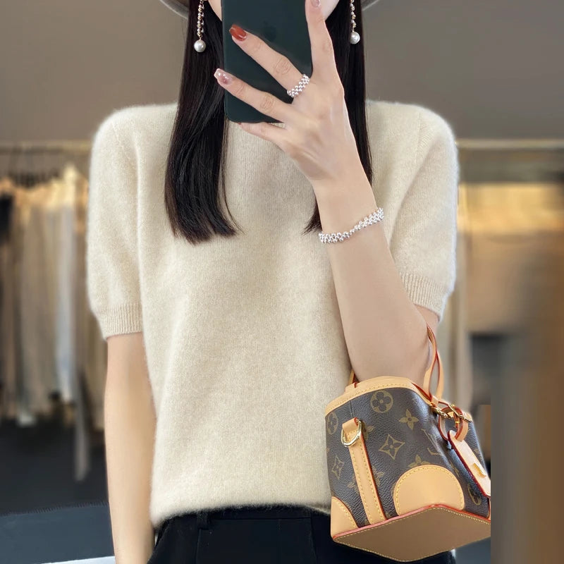 100% pure wool women's round neck sweater short sleeve seamless loose knit half sleeve bottoming sleeve.
